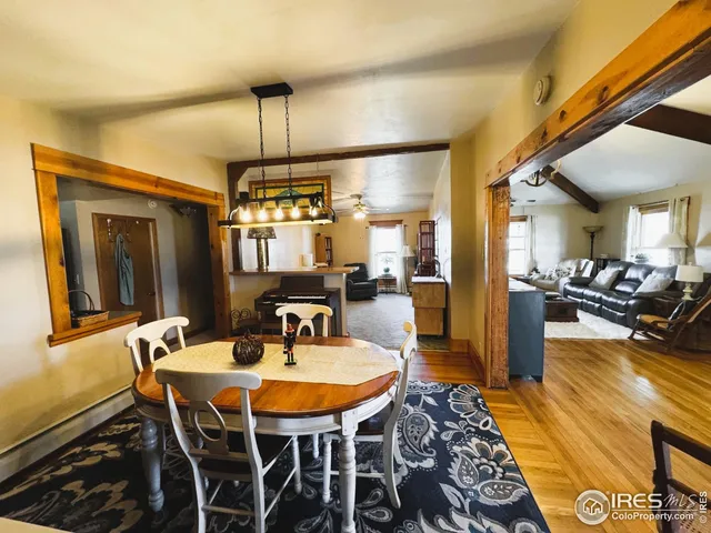 a view of a dining room with furniture