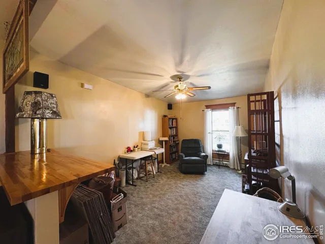 a view of a workspace with furniture