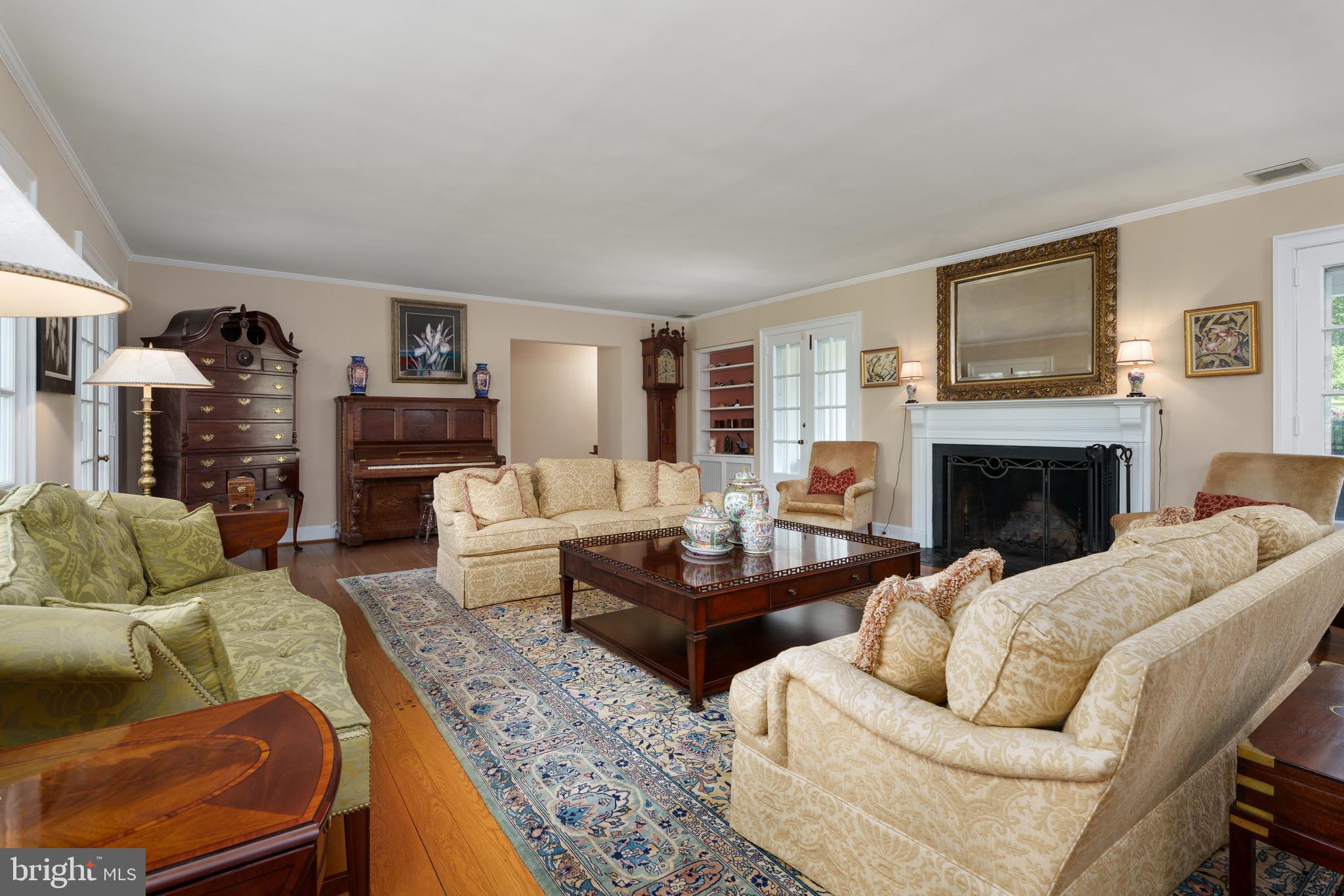 821 Pretty Brook Road Princeton, NJ 08540 - Photo 8 of 32 a living room with furniture and a fireplace