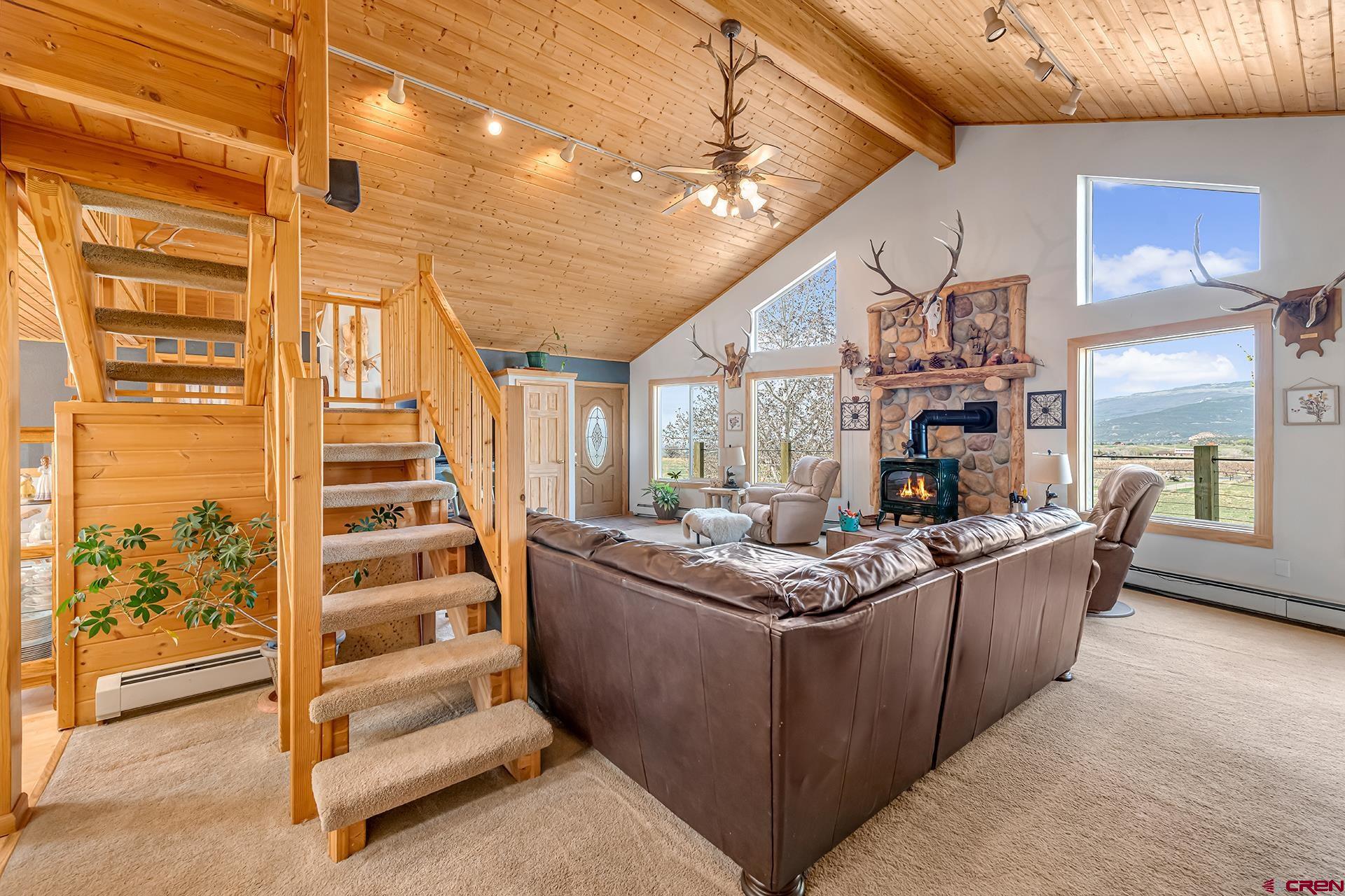 19122 2325th Road Cedaredge, CO 81413 - Photo 15 of 45 a view of living room with a large window