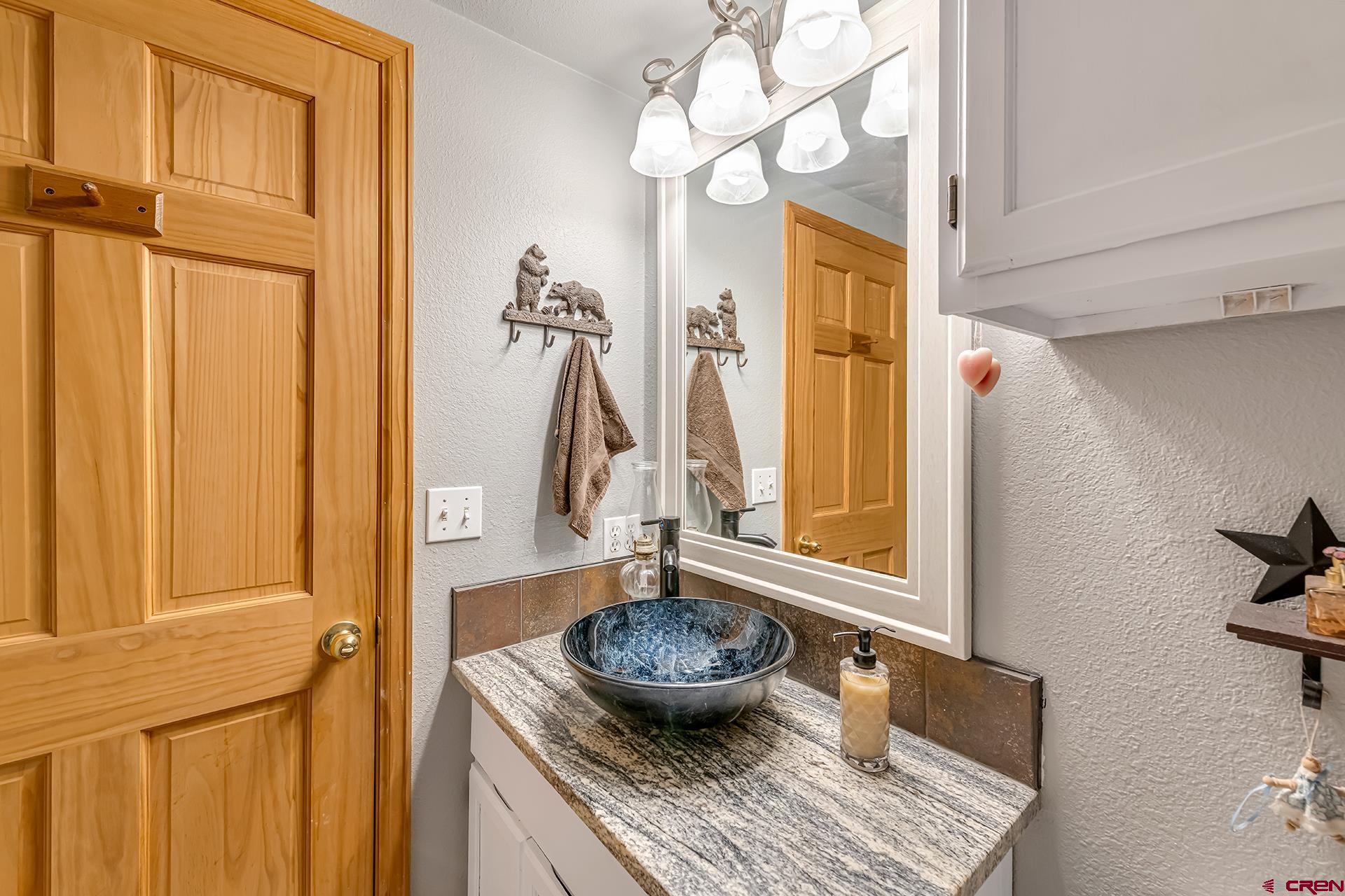 19122 2325th Road Cedaredge, CO 81413 - Photo 26 of 45 a living room with furniture and a window
