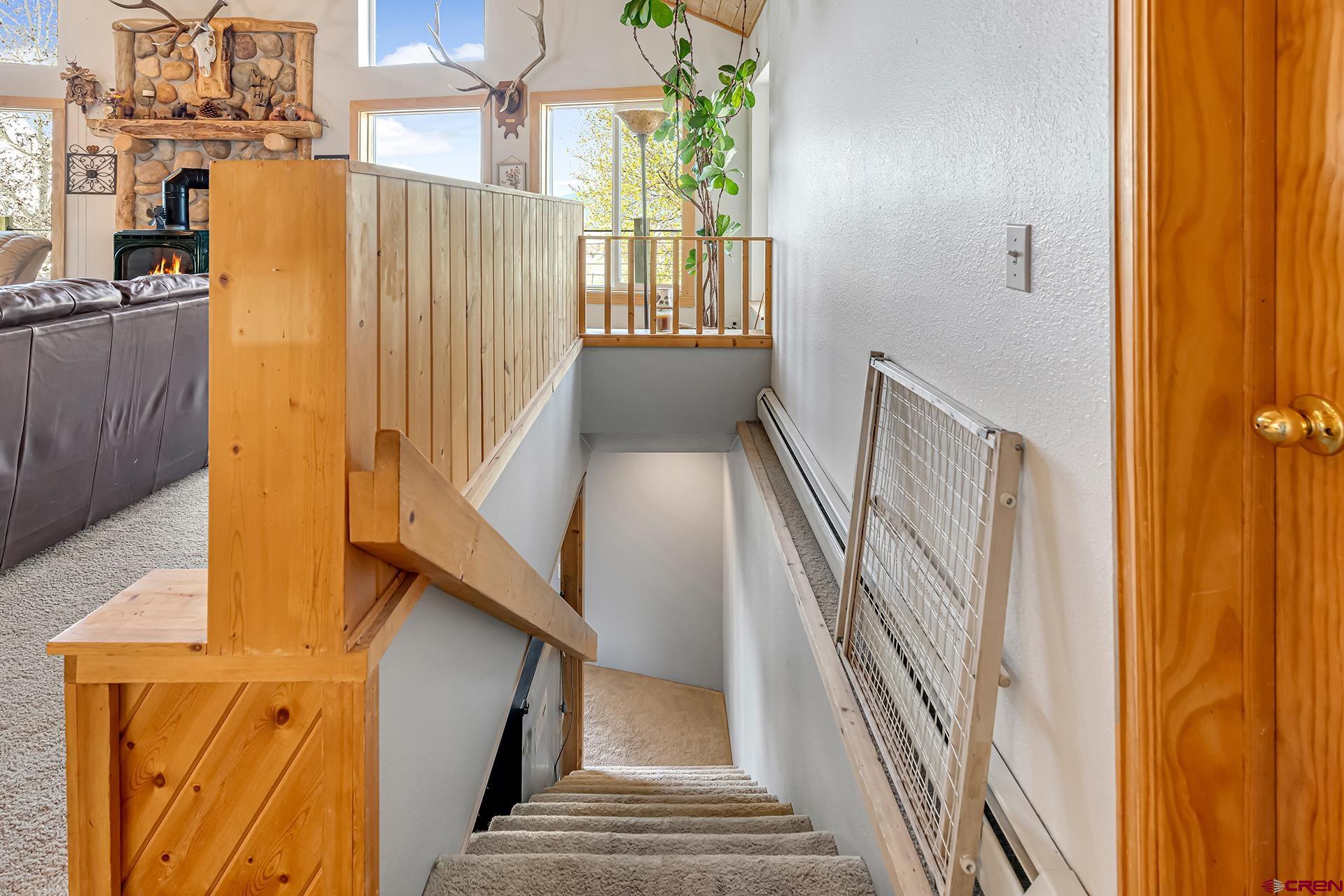 19122 2325th Road Cedaredge, CO 81413 - Photo 28 of 45 a view of entryway and hall with wooden floor