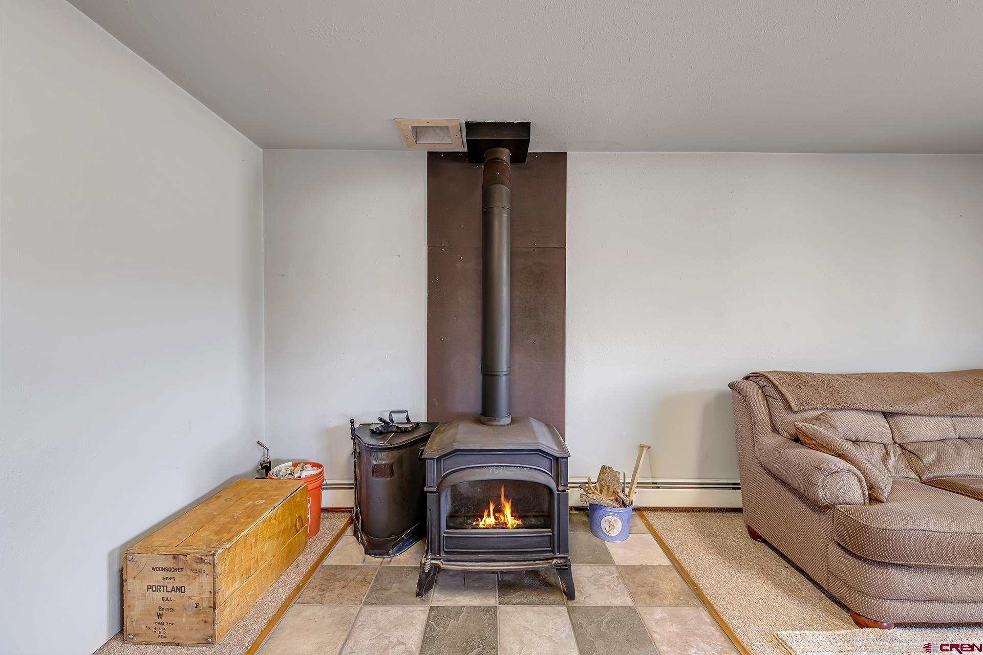 19122 2325th Road Cedaredge, CO 81413 - Photo 33 of 45 a living room with furniture