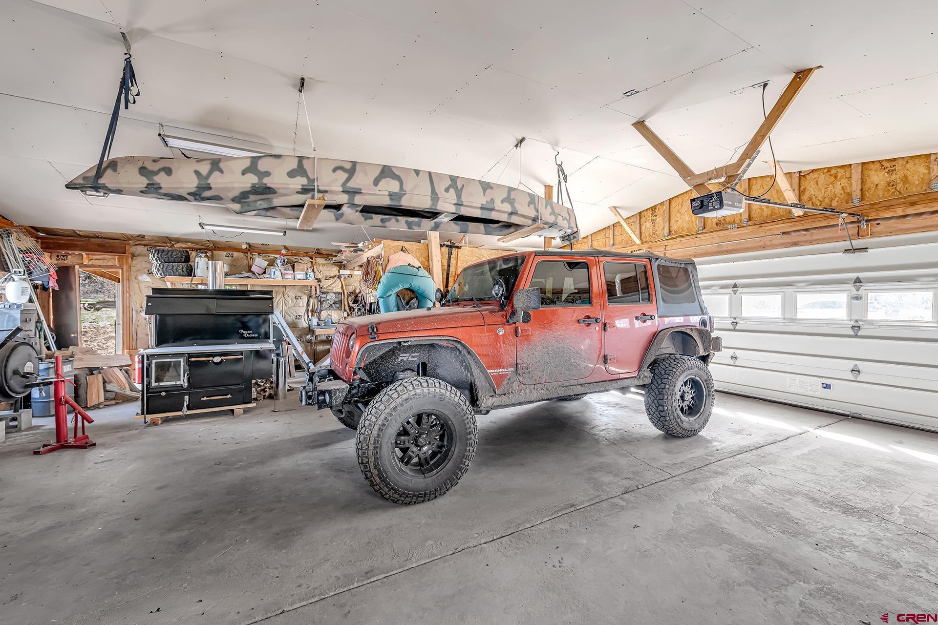 19122 2325th Road Cedaredge, CO 81413 - Photo 41 of 45 a view of a car garage