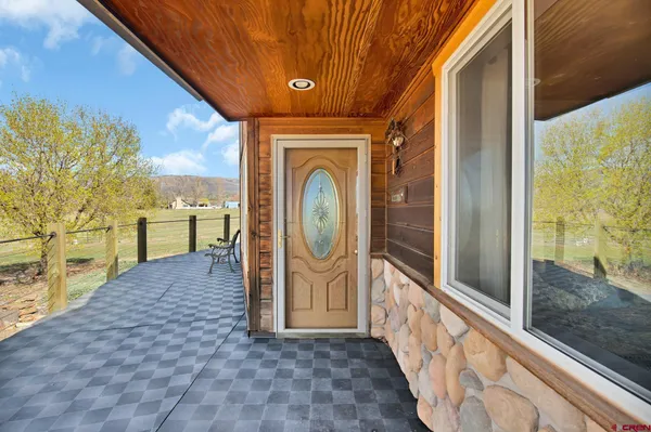 a front view of a door with wooden walls