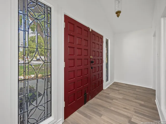 wooden floor and windows in a room