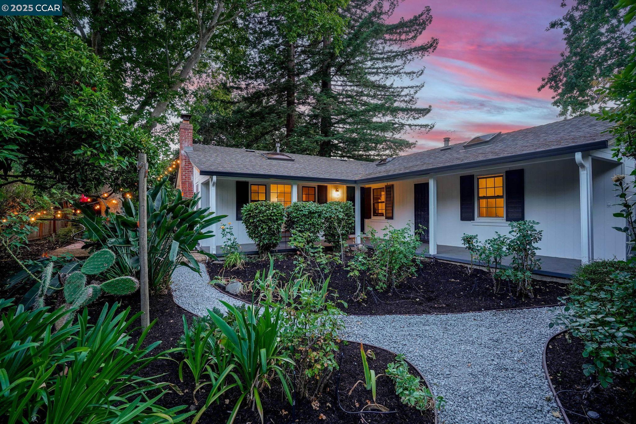 4120 Alhambra Way Martinez, CA 94553 - Photo 1 of 1 a front view of house with yard and green space