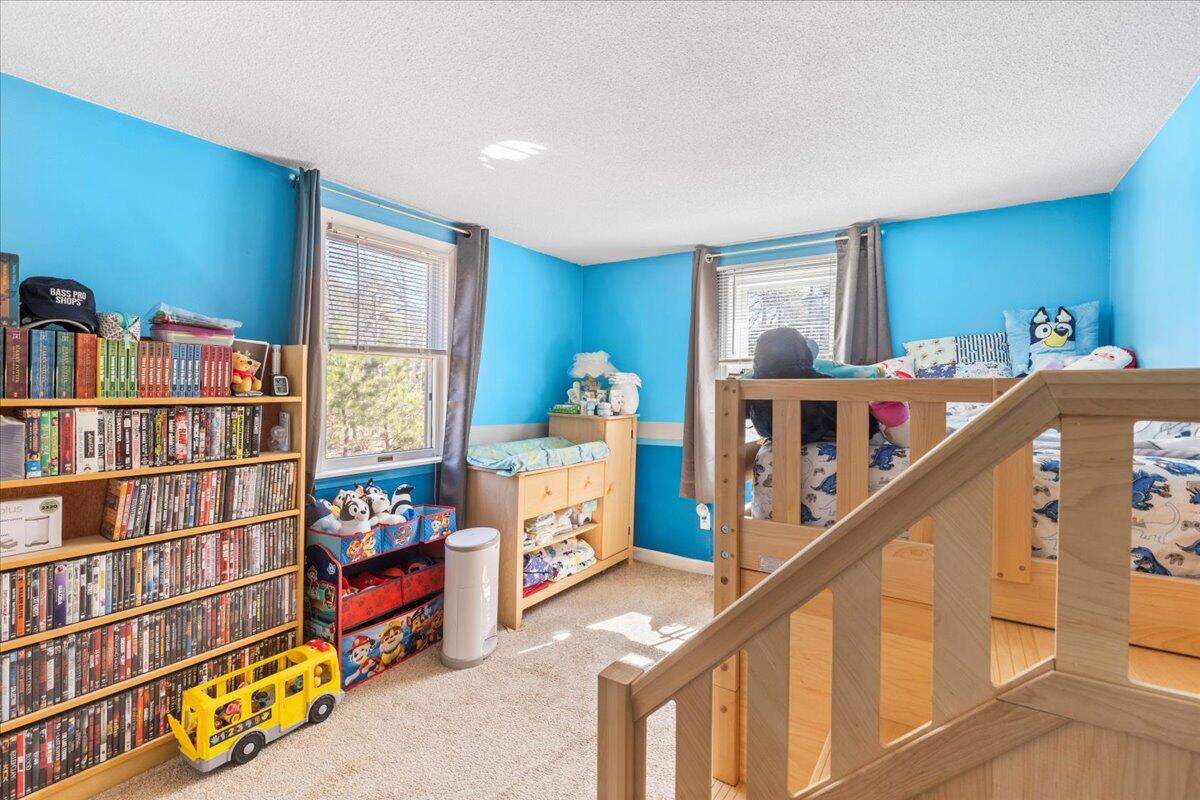 66 Barker Road Wareham, MA 02538 - Photo 15 of 18 a bedroom with furniture and book shelf