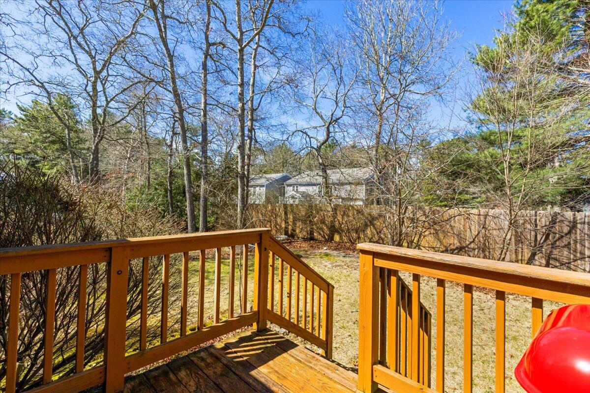 66 Barker Road Wareham, MA 02538 - Photo 17 of 18 a view of a balcony with wooden fence and floor