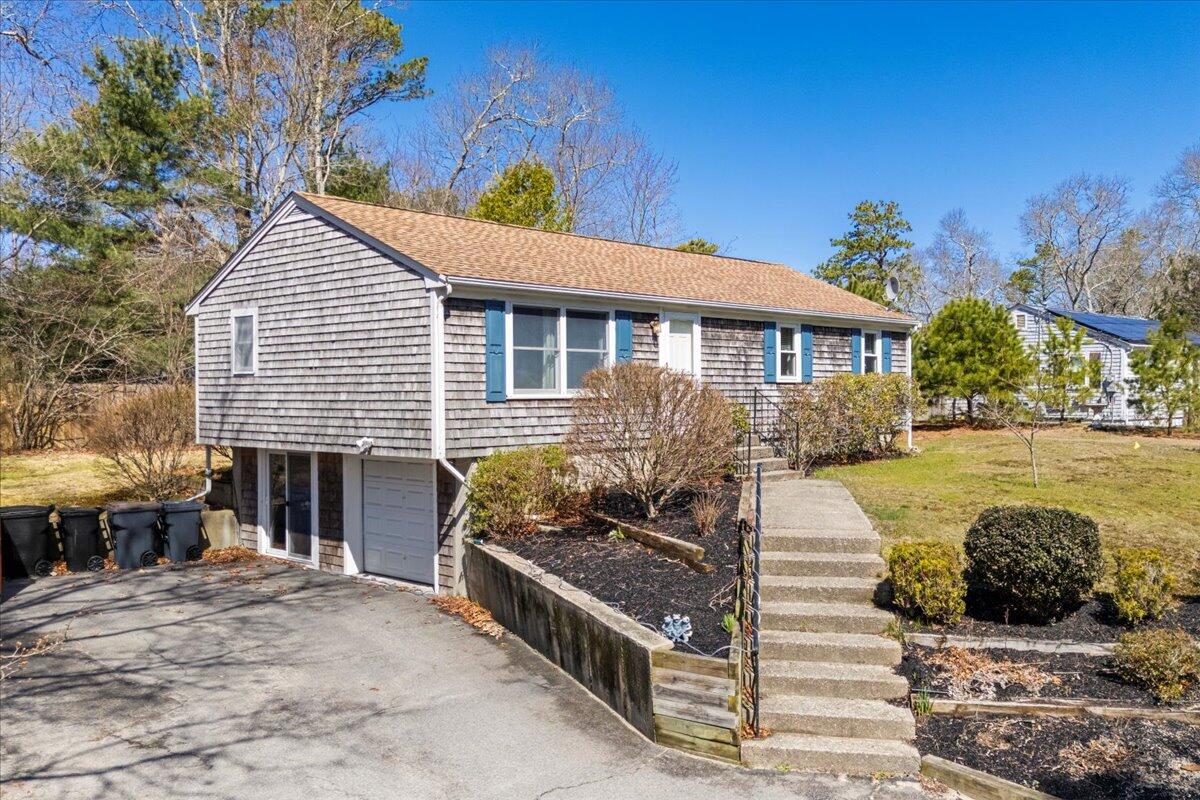 66 Barker Road Wareham, MA 02538 - Photo 4 of 18 a front view of a house with a yard