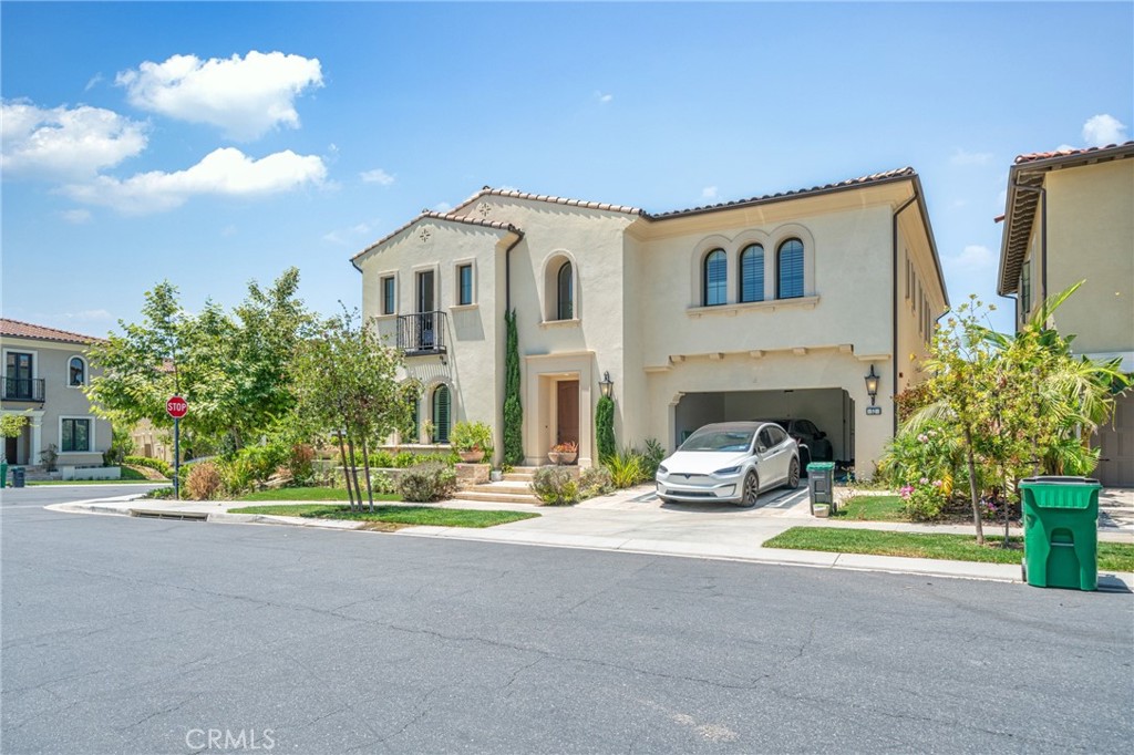 52 Eider Run Irvine, CA 92618 - Photo 2 of 46 a view of a house with small yard and plants