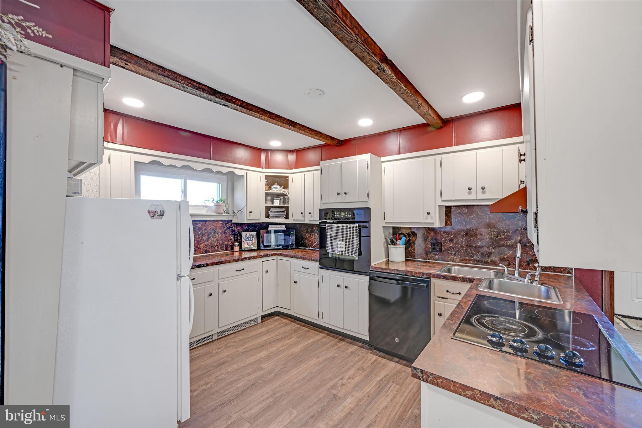 175 Strack Drive Myerstown, PA 17067 - Photo 22 of 52 a kitchen with stainless steel appliances granite countertop a stove and a refrigerator