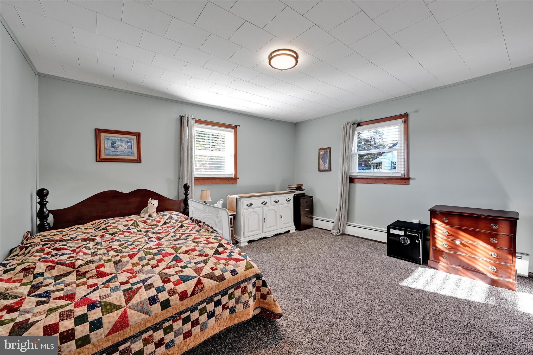 175 Strack Drive Myerstown, PA 17067 - Photo 27 of 52 a bedroom with a bed and a lamp on dresser