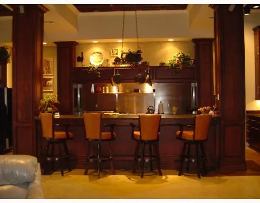 a kitchen with a stove and a microwave