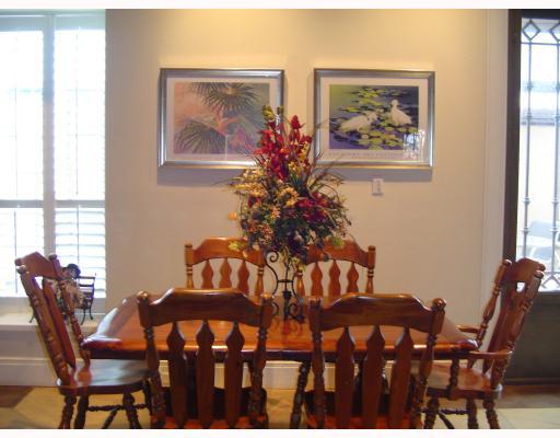 610 Elm Street Portland, TX 78374 - Photo 7 of 10 a view of a dining room with furniture and wooden floor