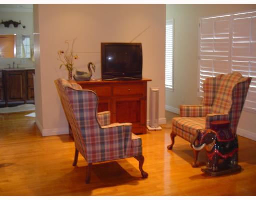 610 Elm Street Portland, TX 78374 - Photo 8 of 10 a living room with furniture and a flat screen tv