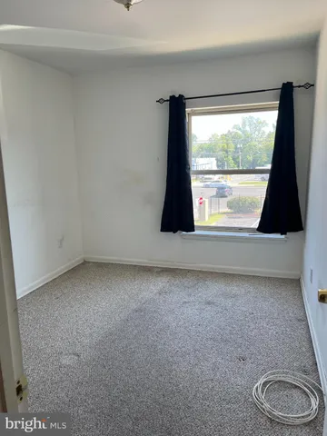 a view of a room with window and lake view