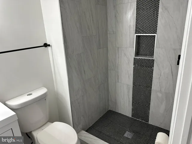 a view of a backyard of the house