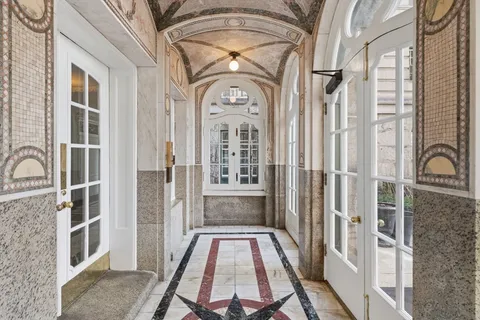 a view of a hallway with entryway