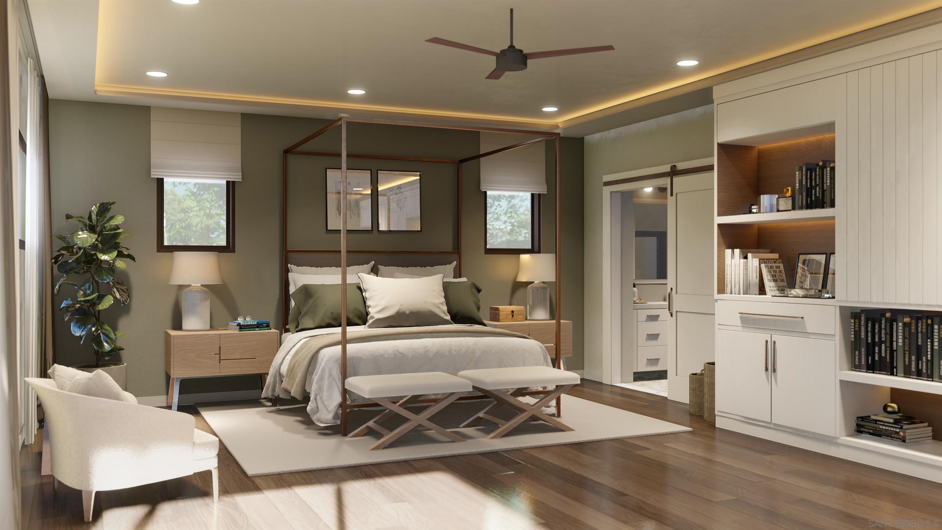 0 Via Rancho Cielo, Unit 6 Rancho Santa Fe, CA 92067 - Photo 16 of 16 a bedroom with a large bed a flat tv screen and a bookshelf