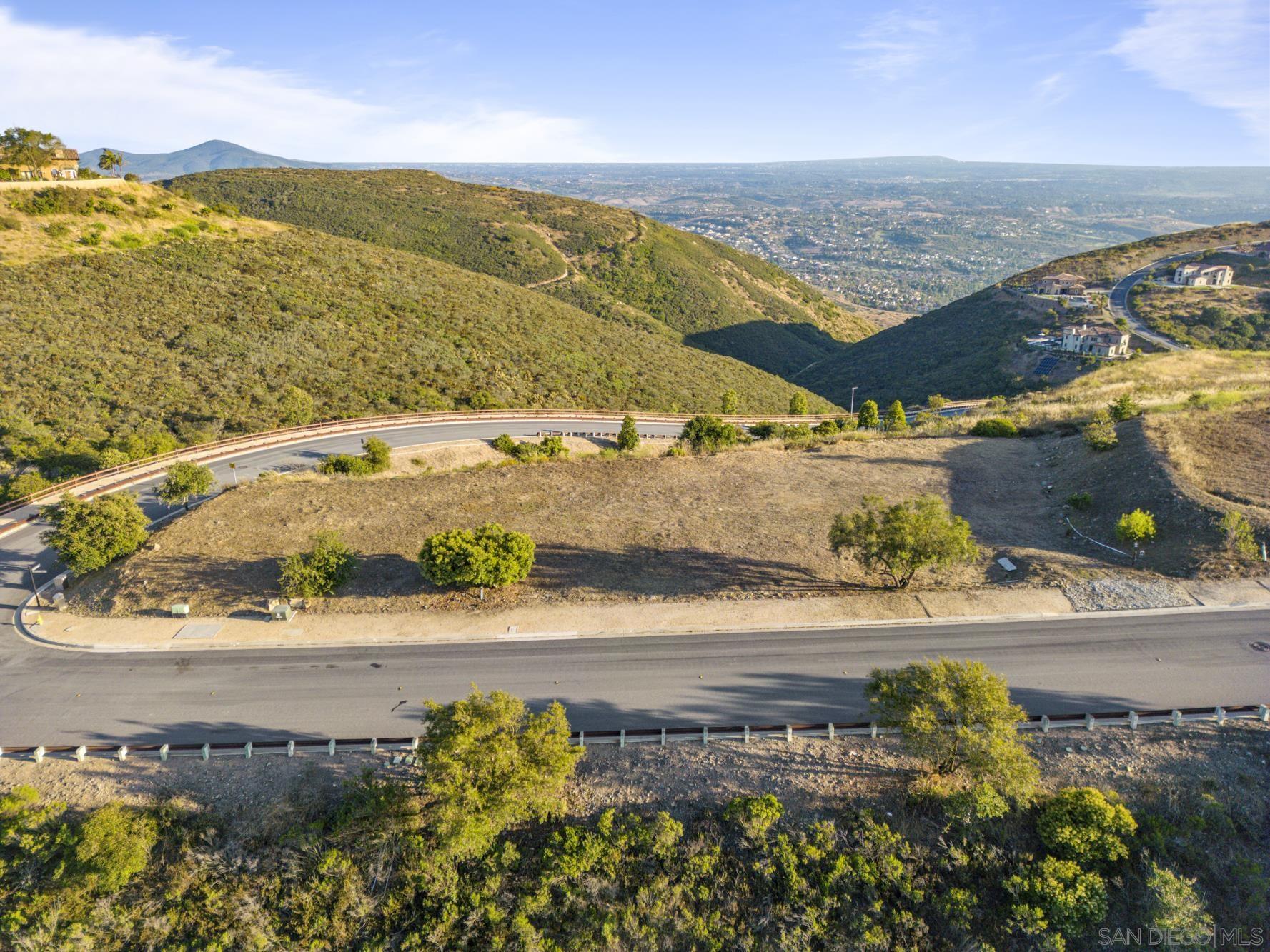 0 Via Rancho Cielo, Unit 6 Rancho Santa Fe, CA 92067 - Photo 2 of 16 a view of an ocean and a mountain