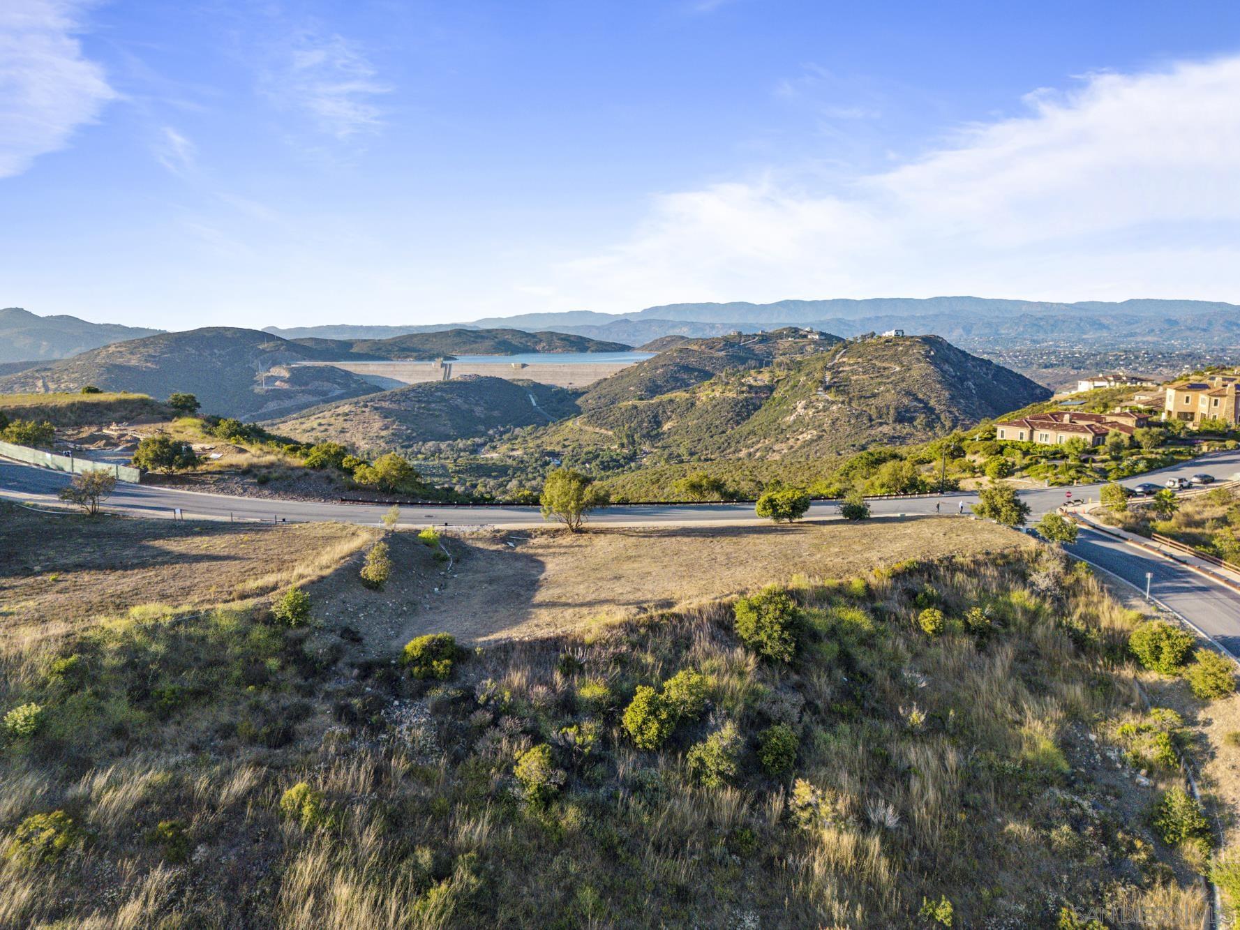 0 Via Rancho Cielo, Unit 6 Rancho Santa Fe, CA 92067 - Photo 4 of 16 a view of lake with mountain
