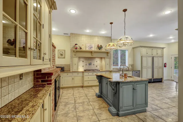a view of a hallway with front door and furniture