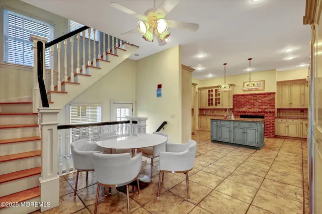 a bathroom with a sink vanity and a mirror