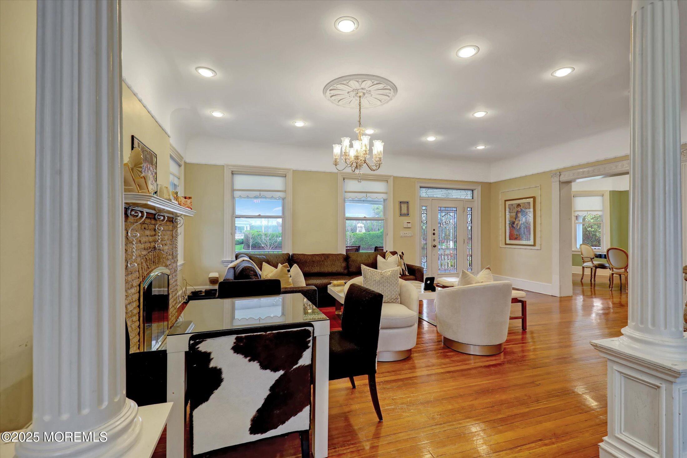 48 Neptune Avenue Deal, NJ 07723 - Photo 29 of 64 a view of a a dining room with furniture window and wooden floor
