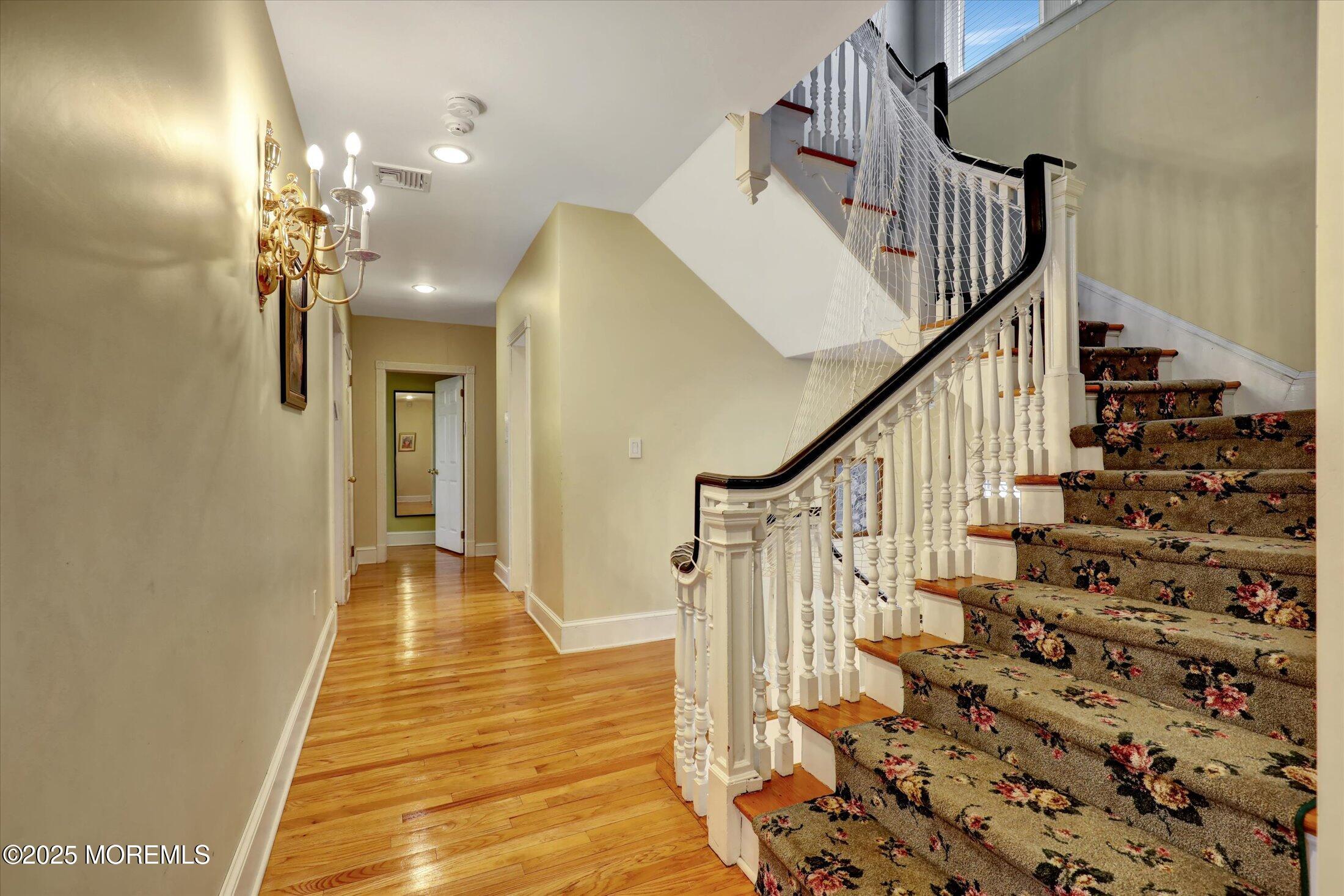 48 Neptune Avenue Deal, NJ 07723 - Photo 42 of 64 a view of entryway and hall with wooden floor