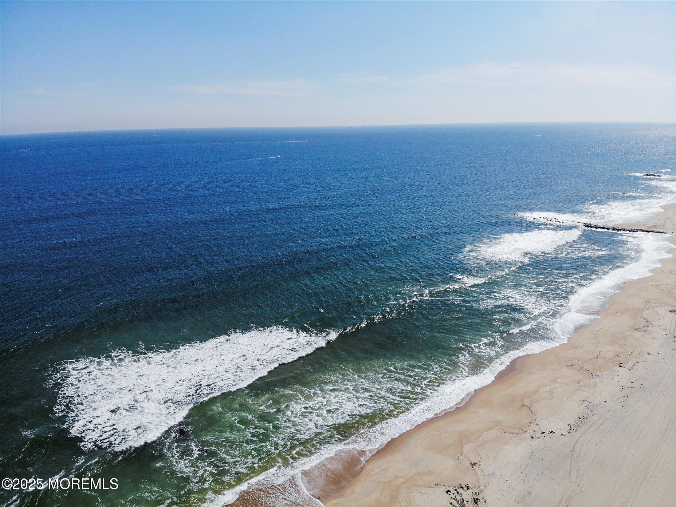48 Neptune Avenue Deal, NJ 07723 - Photo 51 of 64 a view of lake view with beach