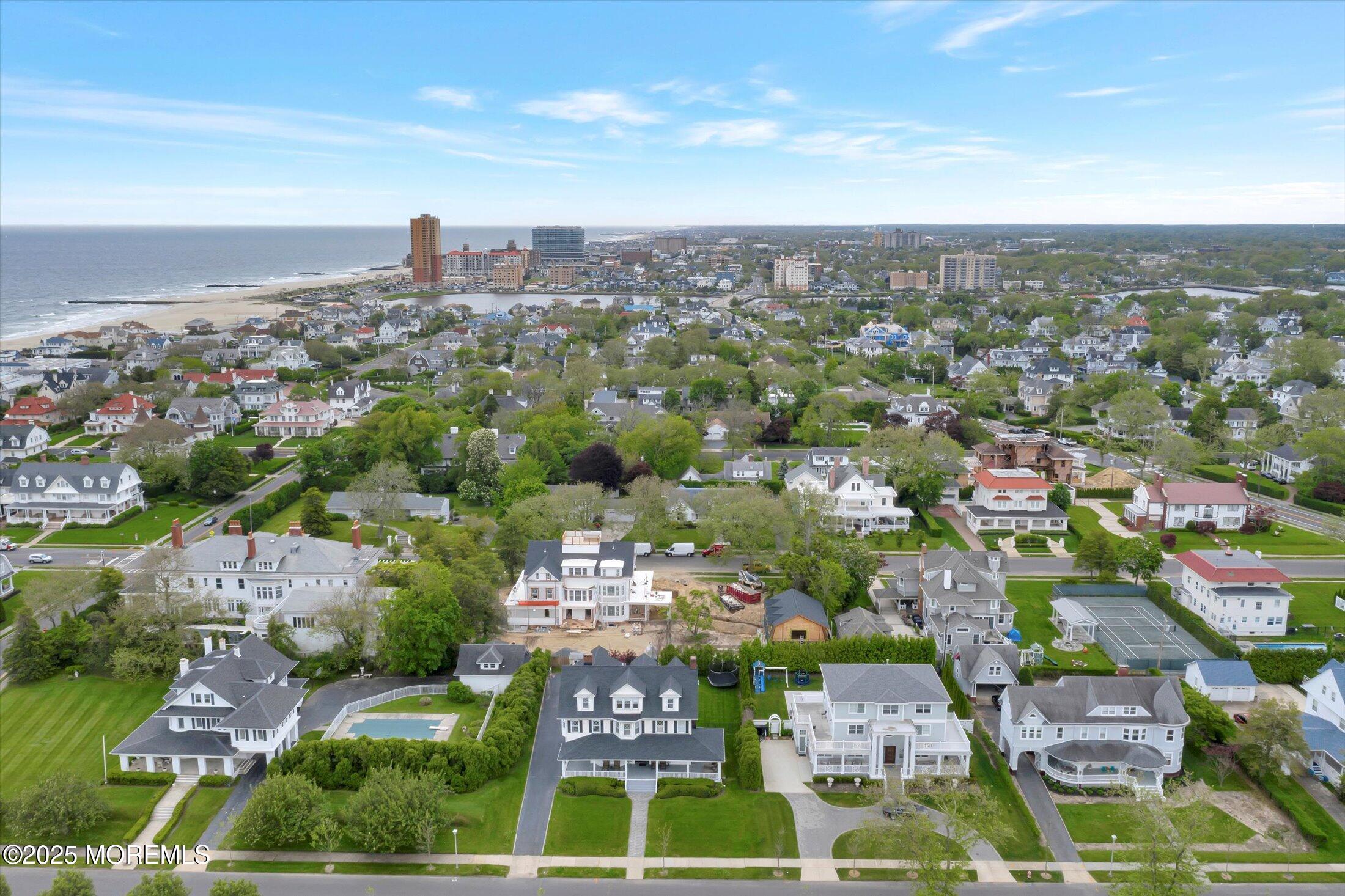 48 Neptune Avenue Deal, NJ 07723 - Photo 60 of 64 an aerial view of a city with lots of residential buildings