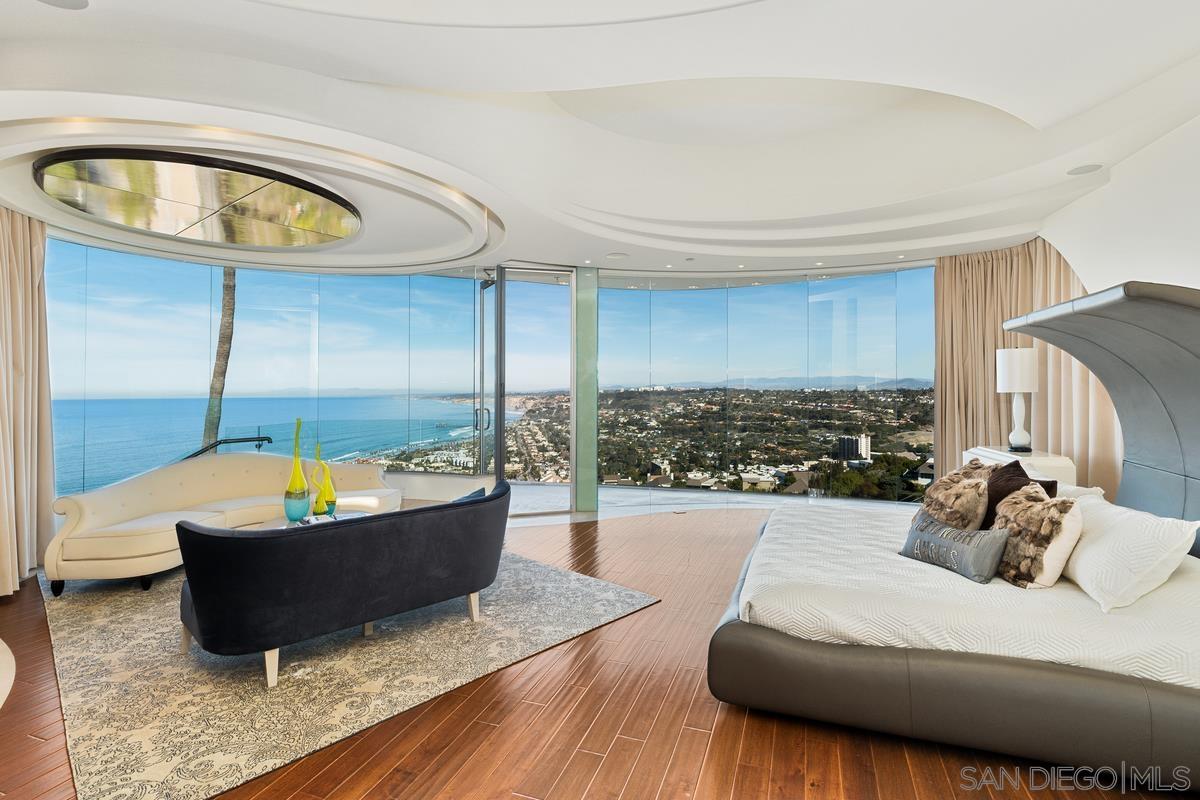 7455 Hillside Drive La Jolla, CA 92037 - Photo 13 of 33 a living room with furniture and a pool
