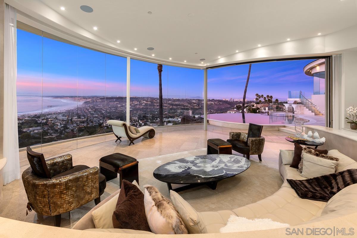 7455 Hillside Drive La Jolla, CA 92037 - Photo 30 of 33 a living room with furniture and lamp