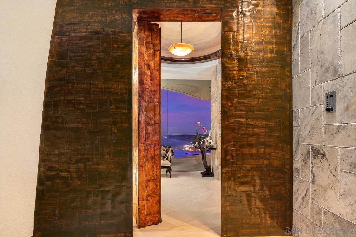 7455 Hillside Drive La Jolla, CA 92037 - Photo 4 of 33 a bathroom with a shower and a sink