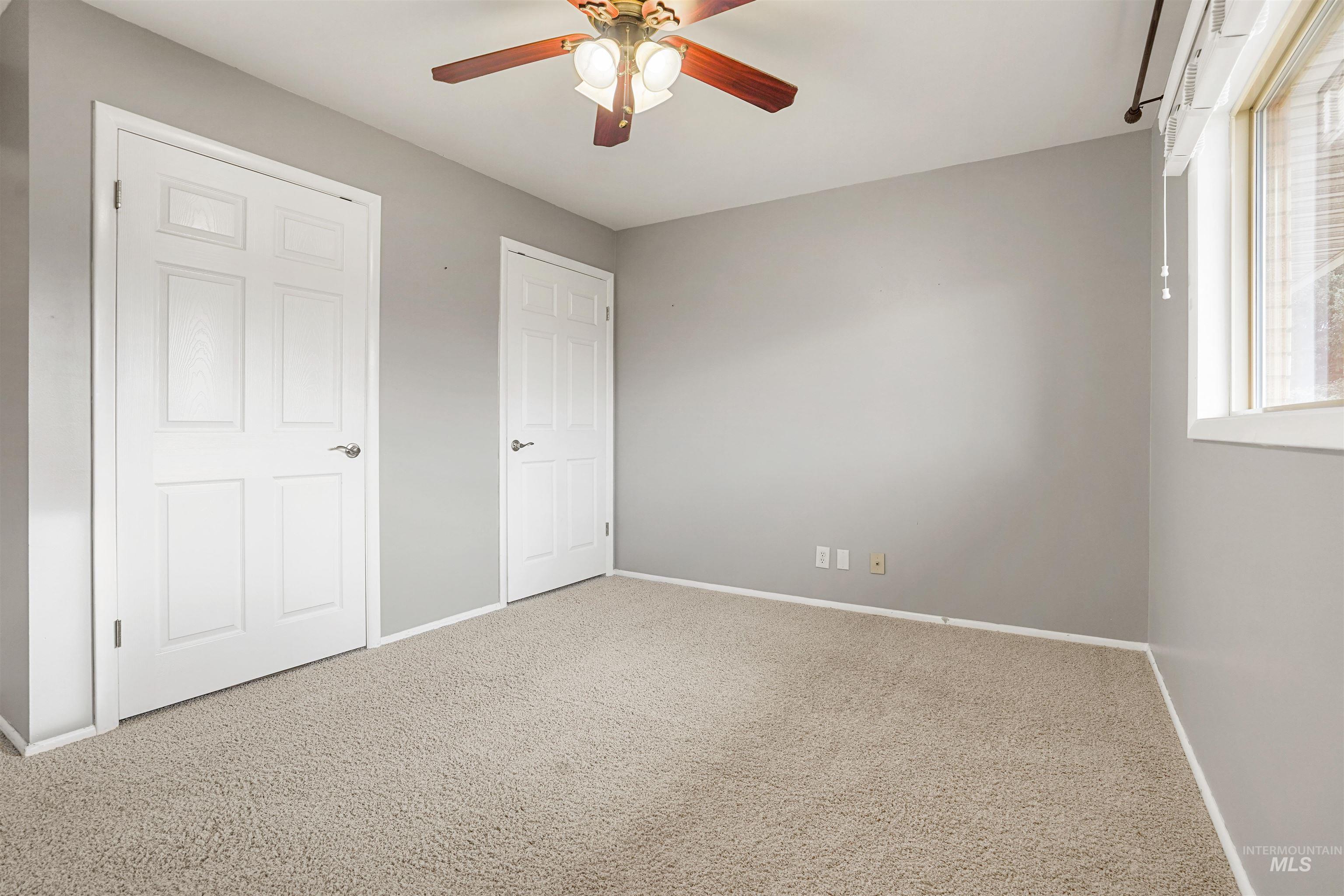 206 Pleasant Way Rupert, ID 83350 - Photo 13 of 33 Unfurnished bedroom featuring carpet and a ceiling fan