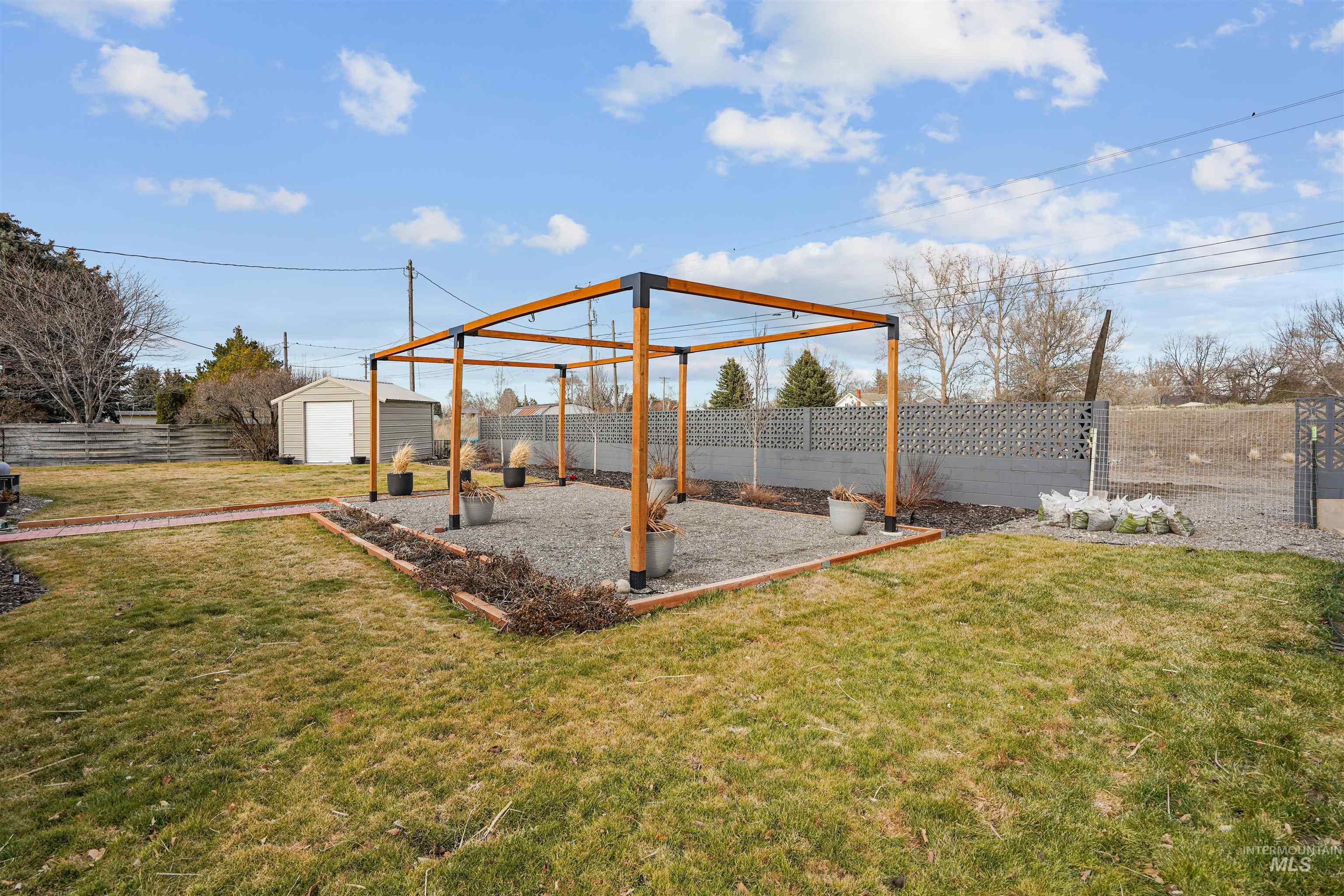 206 Pleasant Way Rupert, ID 83350 - Photo 30 of 33 Fenced backyard featuring a storage shed