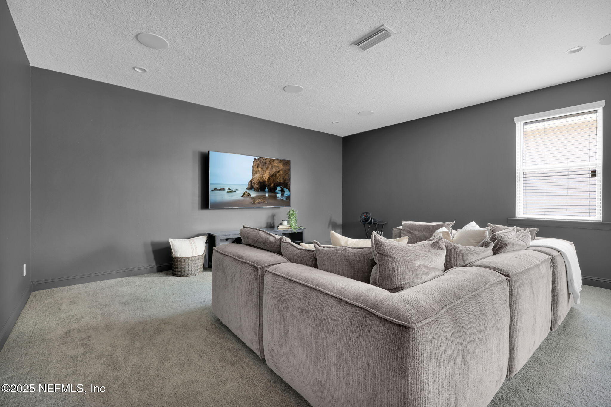 303 Gulfstream Way Ponte Vedra, FL 32081 - Photo 12 of 120 a living room with furniture and a flat screen tv