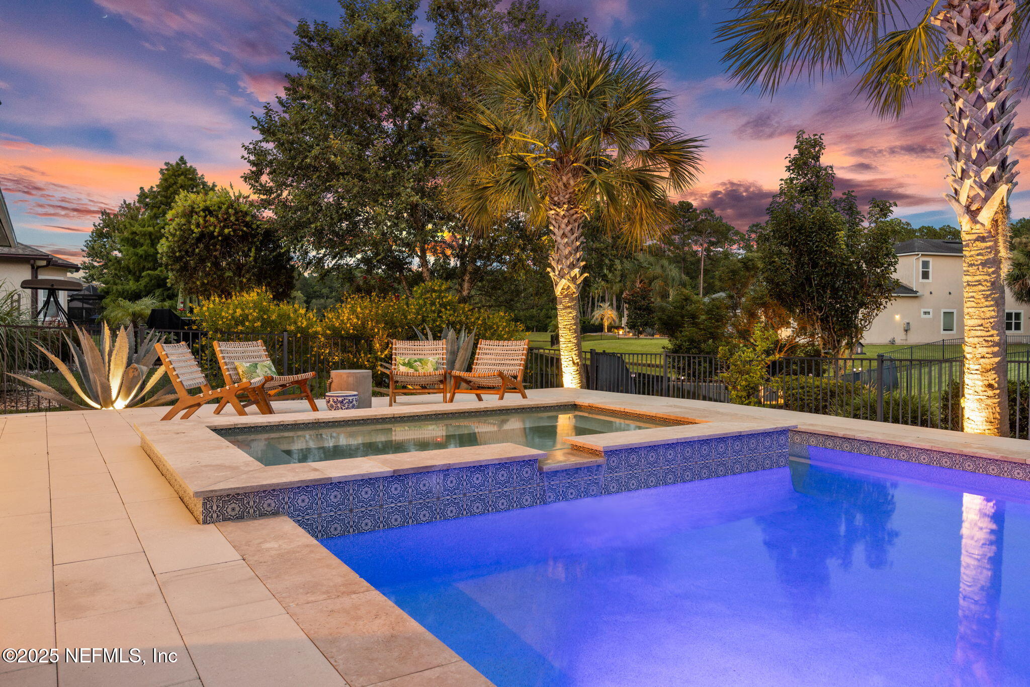 303 Gulfstream Way Ponte Vedra, FL 32081 - Photo 3 of 120 a view of a swimming pool with an outdoor space and seating area