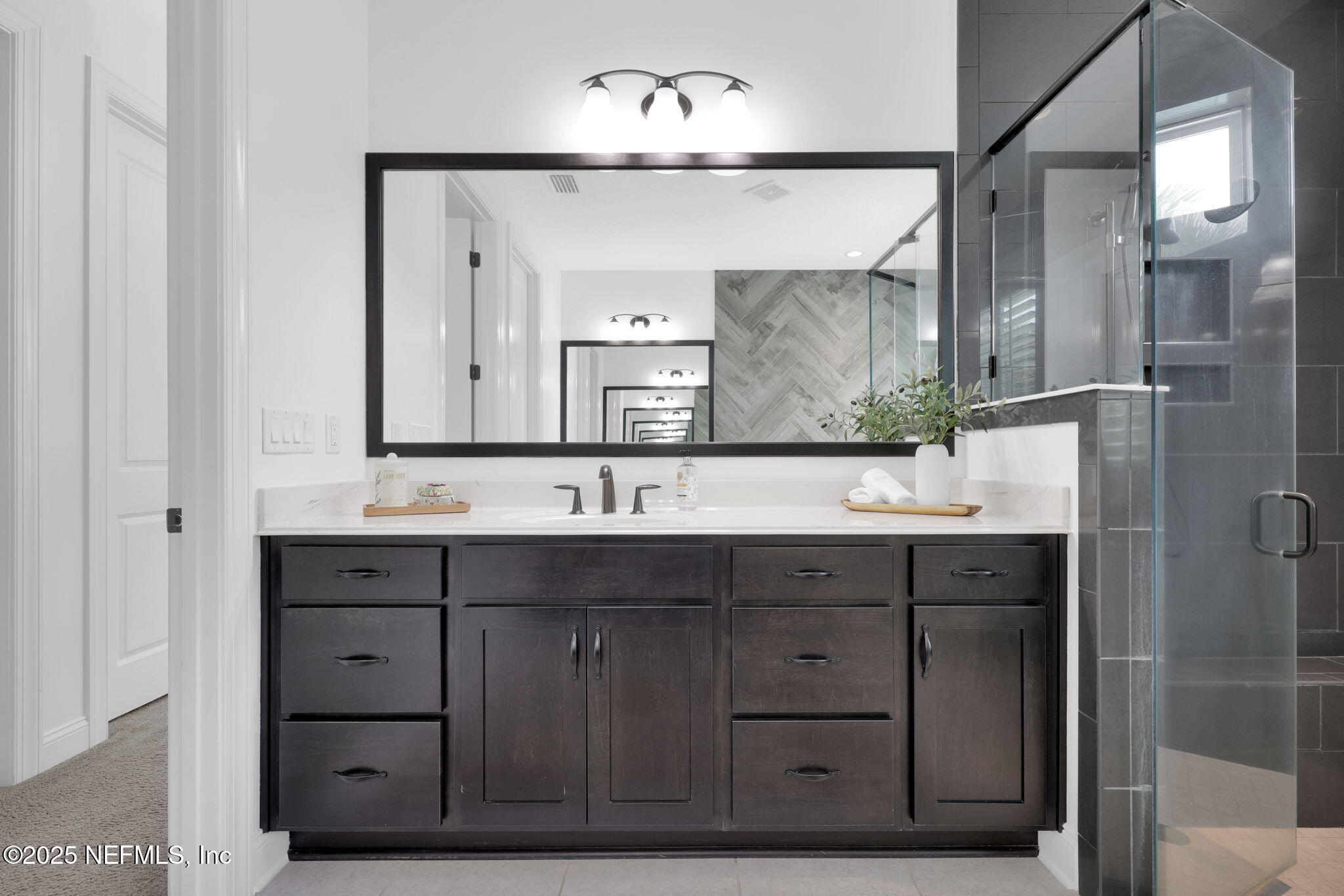 303 Gulfstream Way Ponte Vedra, FL 32081 - Photo 36 of 120 a bathroom with a double vanity sink mirror and double