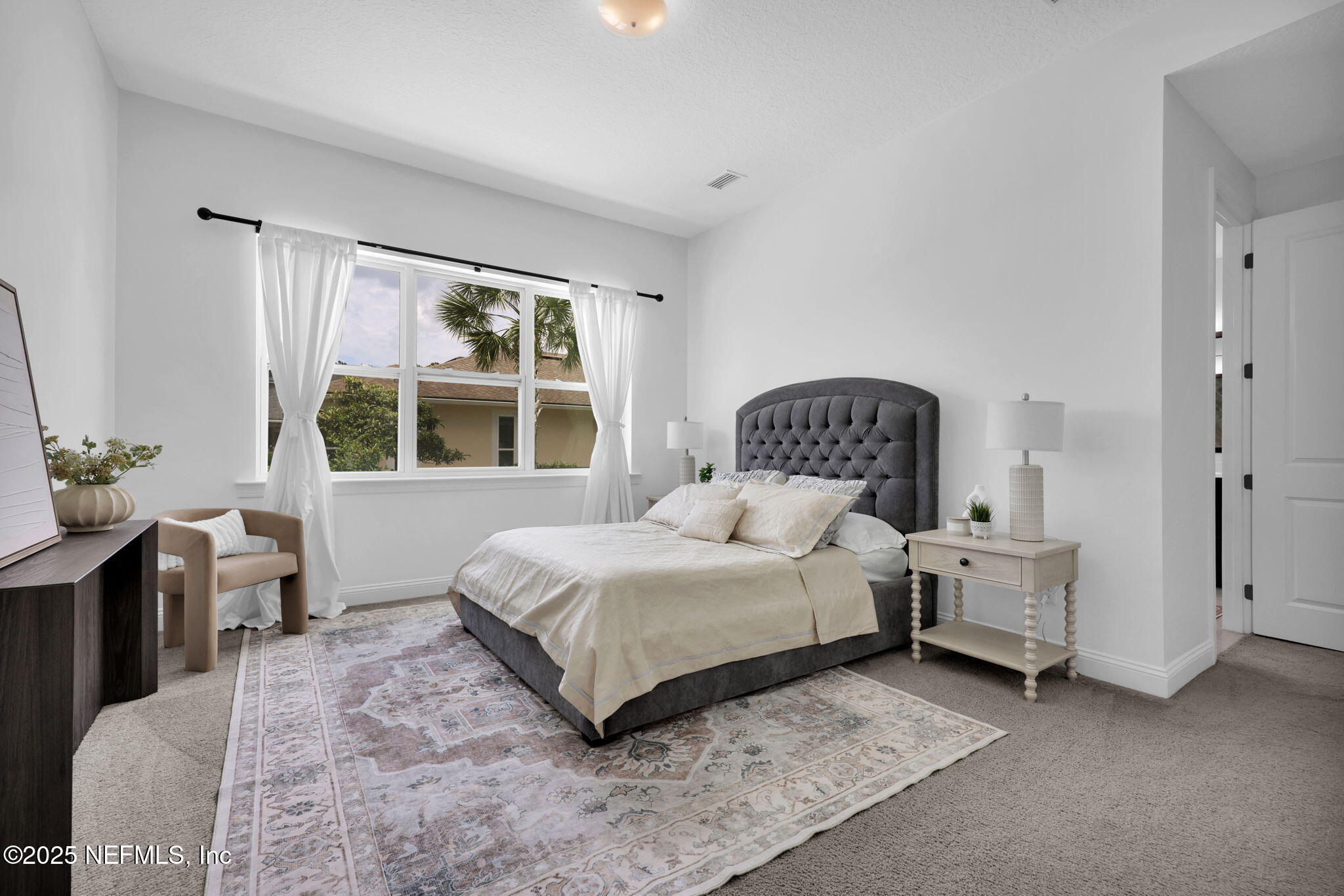 303 Gulfstream Way Ponte Vedra, FL 32081 - Photo 37 of 120 a bedroom with a bed and a large window