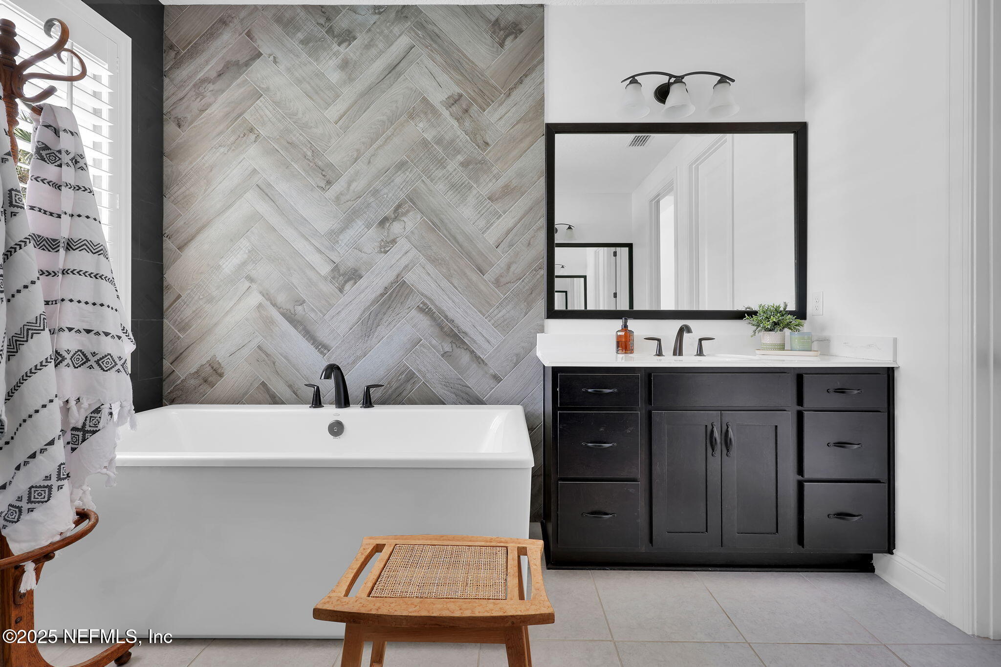 303 Gulfstream Way Ponte Vedra, FL 32081 - Photo 38 of 120 a bathroom with a sink vanity and mirror