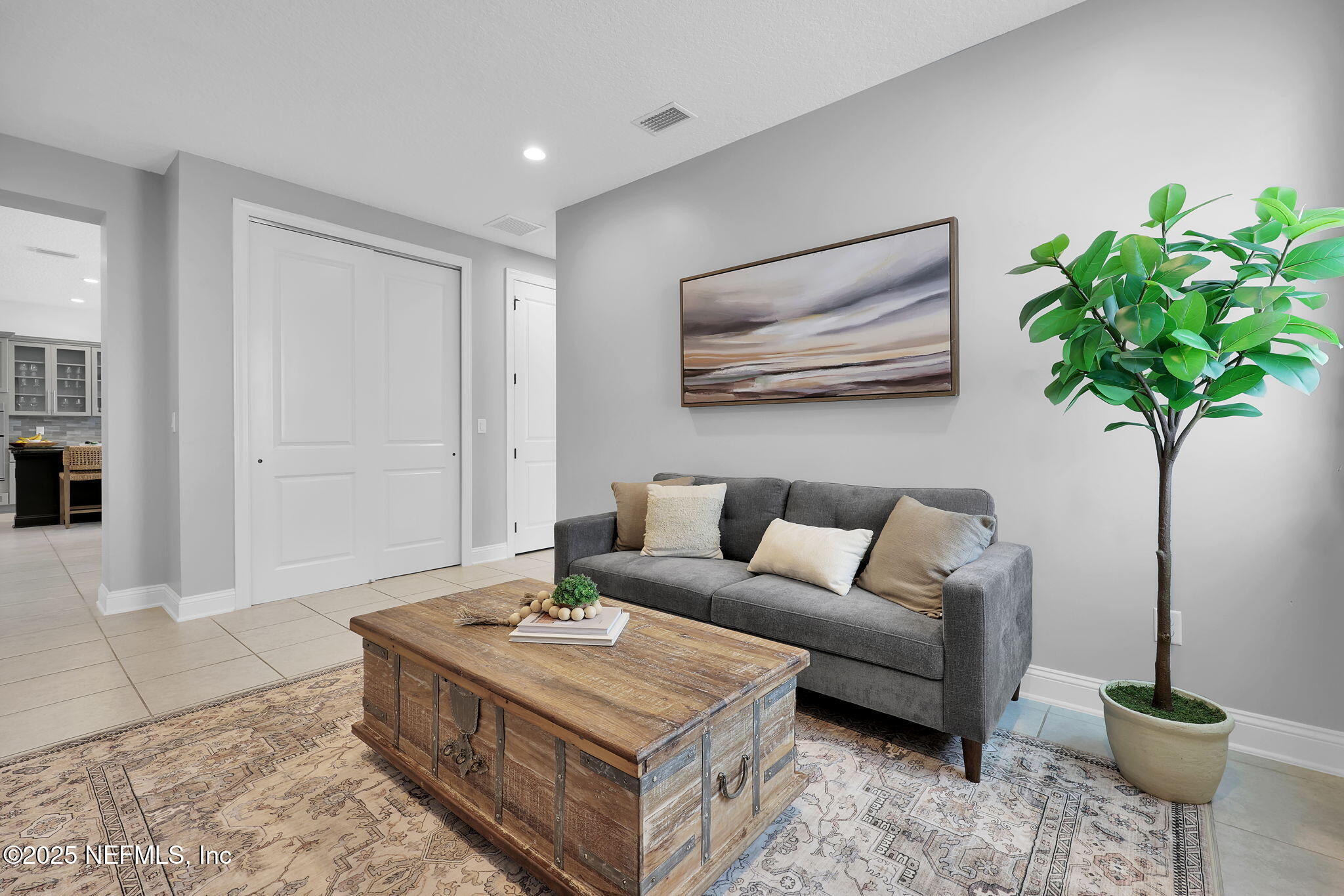 303 Gulfstream Way Ponte Vedra, FL 32081 - Photo 43 of 120 a living room with furniture a potted plant and a lamp