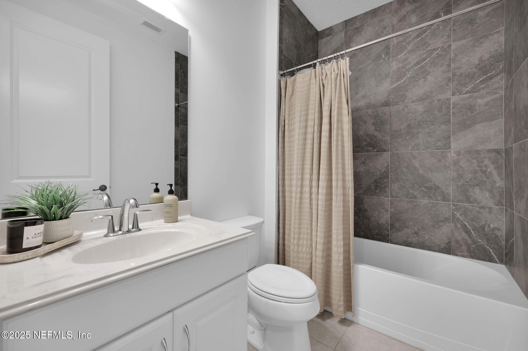 303 Gulfstream Way Ponte Vedra, FL 32081 - Photo 45 of 120 a bathroom with a sink a toilet a tub and shower