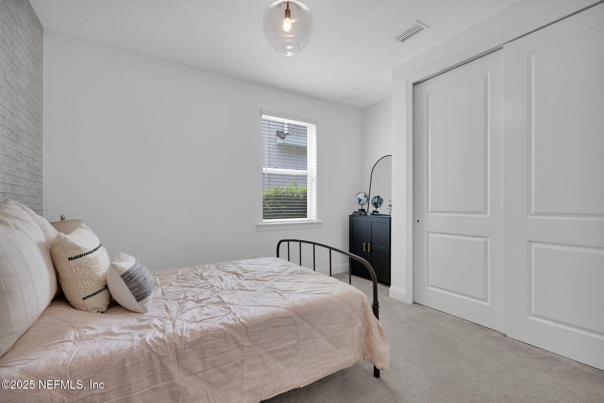 303 Gulfstream Way Ponte Vedra, FL 32081 - Photo 46 of 120 a bedroom with a bed and window