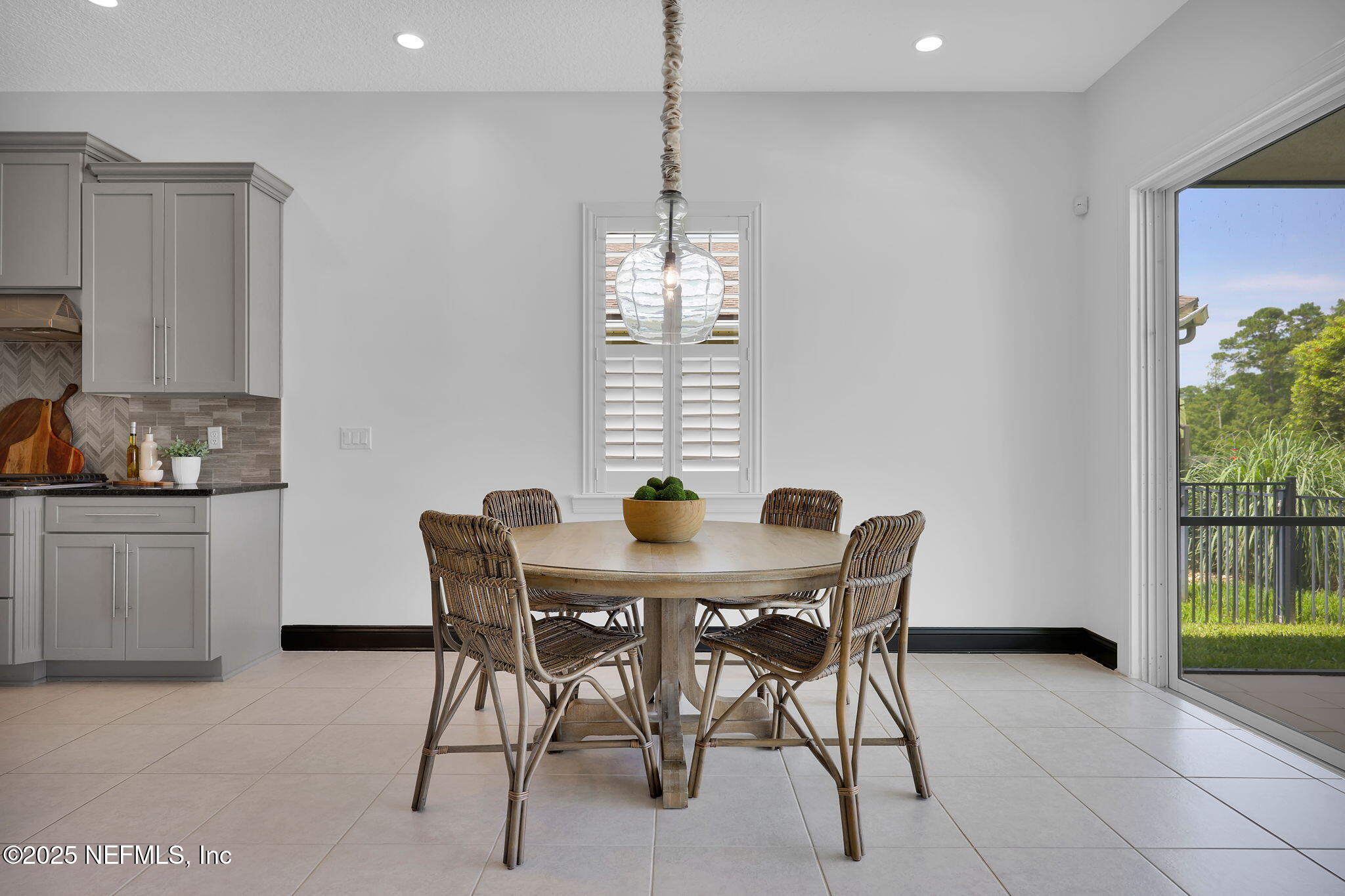 303 Gulfstream Way Ponte Vedra, FL 32081 - Photo 6 of 120 a dining room with furniture and window