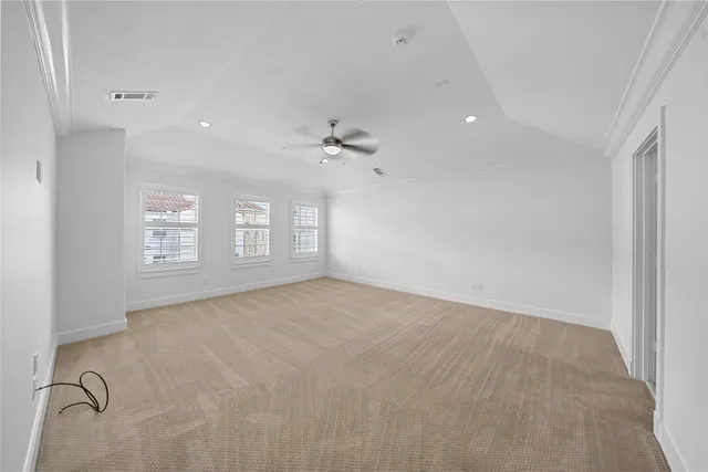 a bathroom with a granite countertop sink a toilet and a mirror