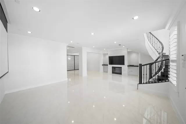 a view of a livingroom with a kitchen