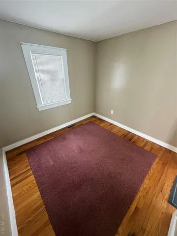 an empty room with window