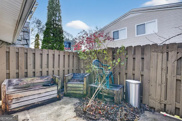 a view of outdoor space with deck and outdoor seating